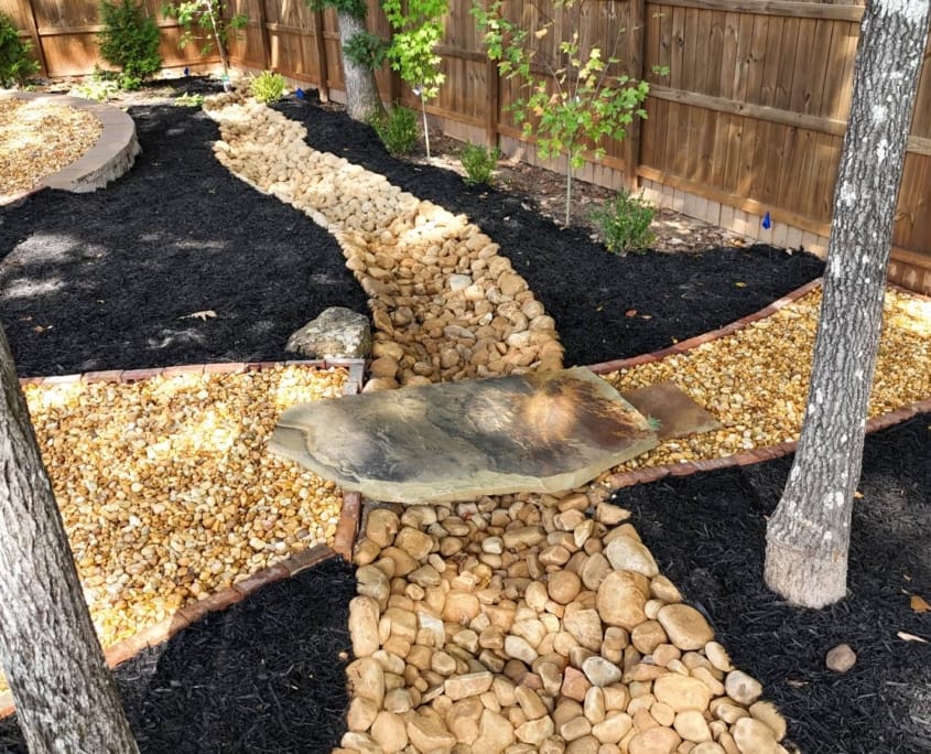 stone slab bridge over drainage